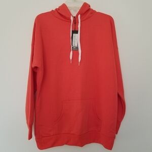 Orange oversized pullover drawstring hoodie.